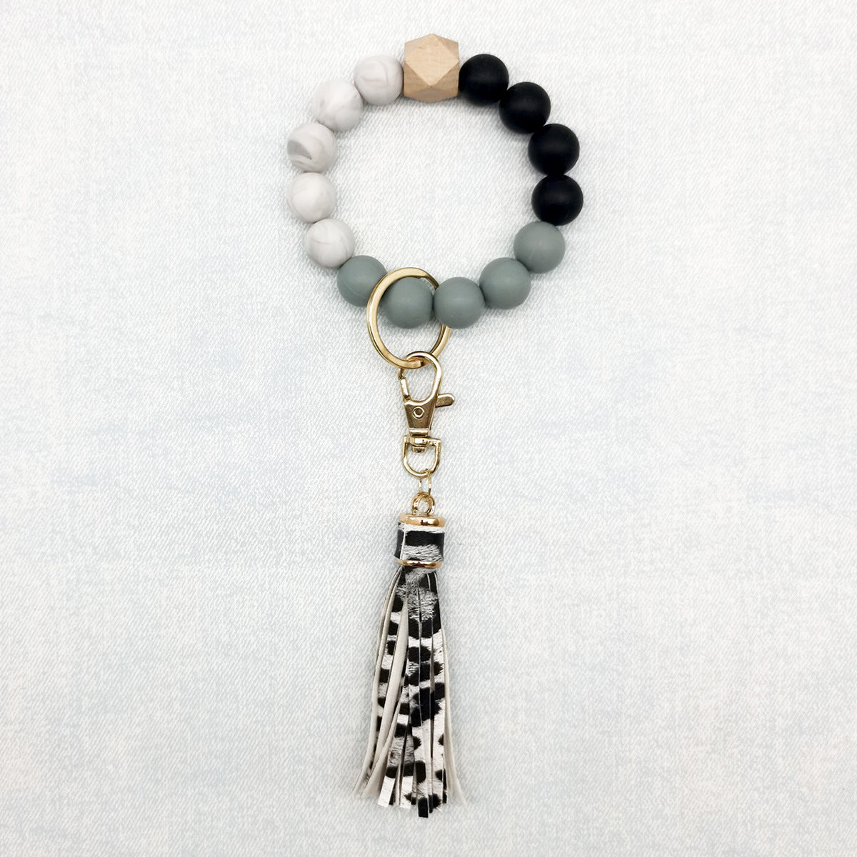 Pulsera de cuentas de silicona con borlas al por mayor llavero de muñeca